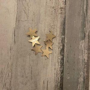 alterd state gold star dangle earrings